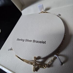 Gold-Tone Cross Bracelet with Clear Crystal Accents